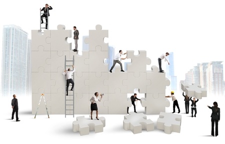 strategische samenwerking, 31364187 - business team builds a new company with puzzle